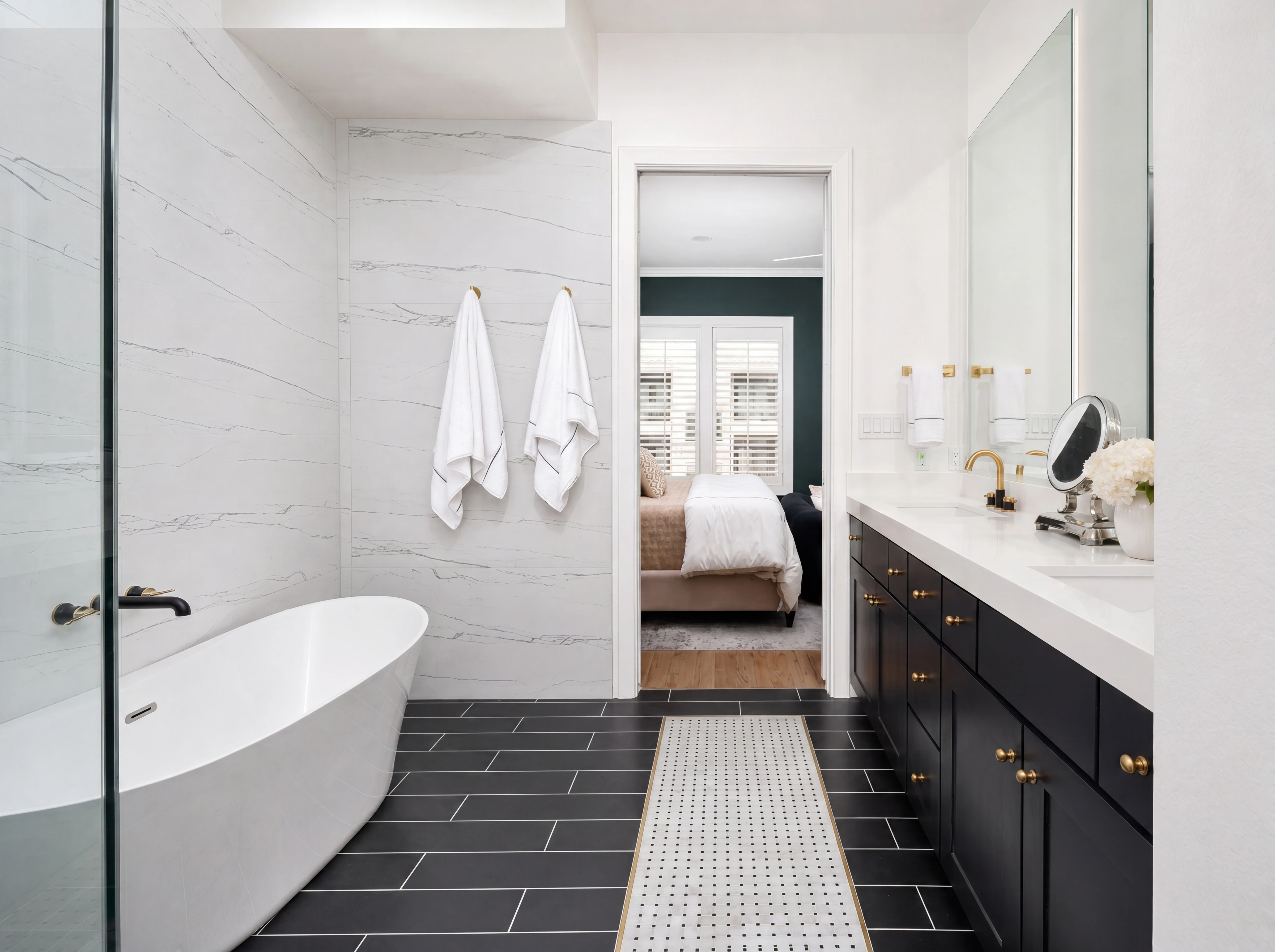 Primary bath with freestanding tub and marble shower
