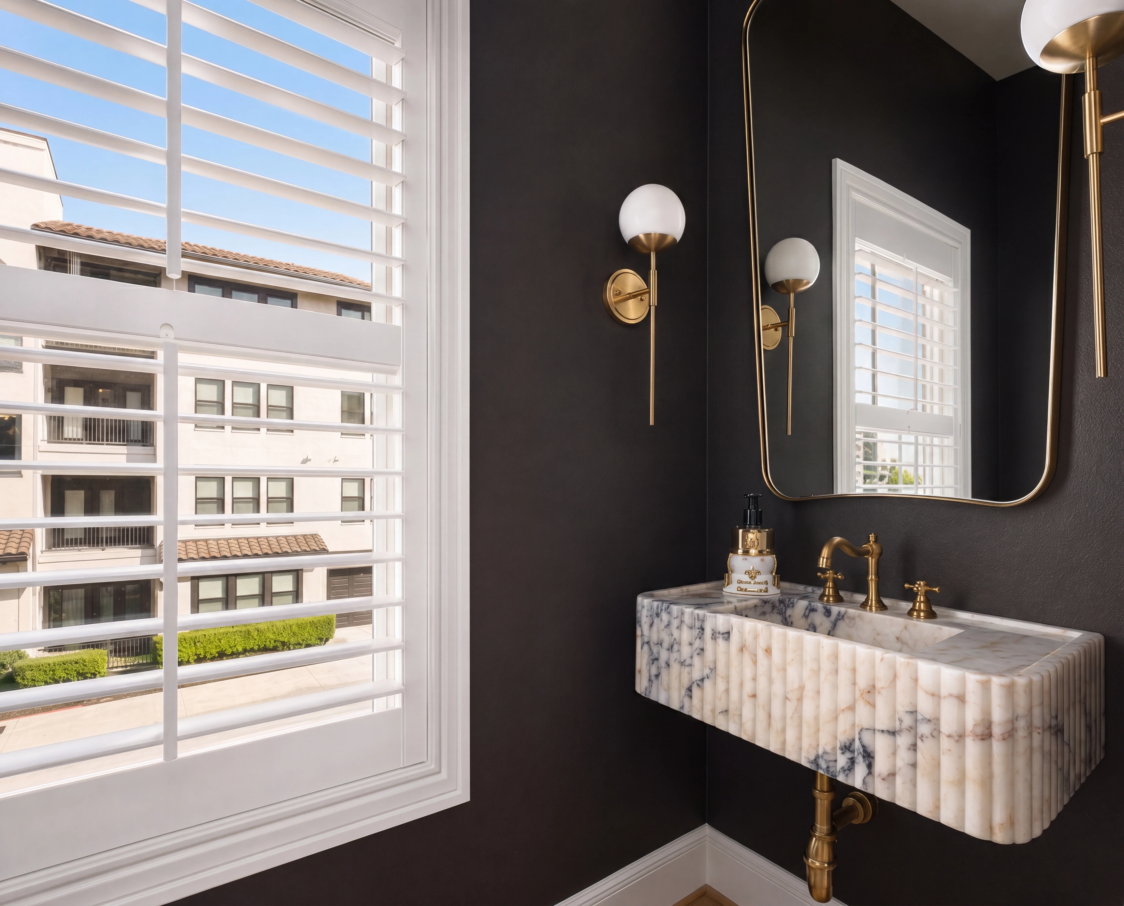 Designer powder bath with sculpted vessel sink