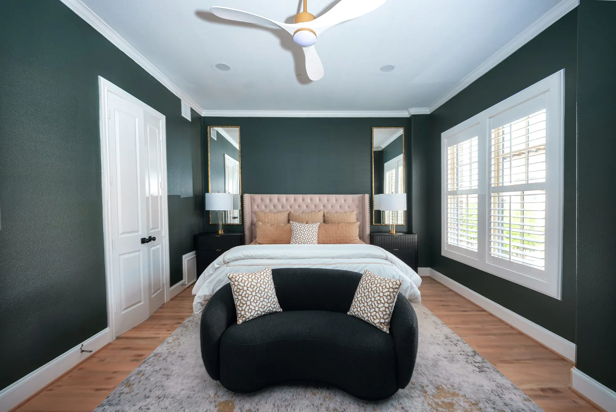 Primary suite with designer green accent wall
